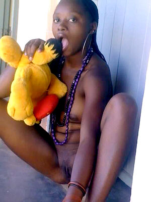Wild black teenager showing young ebony tits and flashing slit